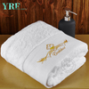 Asciugamani per hotel boutique di colore bianco eccellente in cotone 100% con logo ricamato